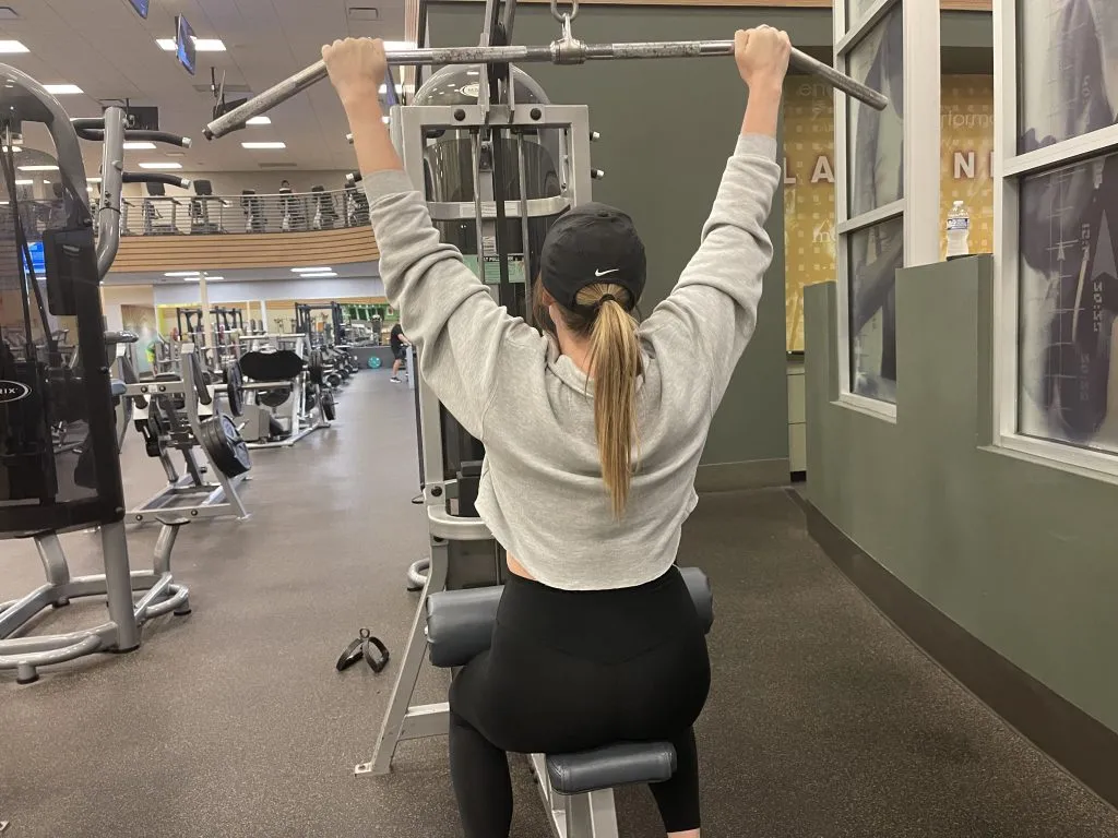 Client performing lat pulldowns during a training session