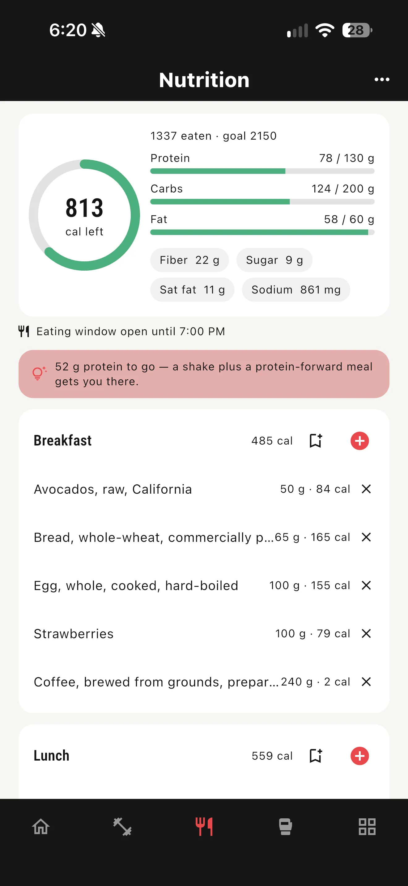 App nutrition screen showing calories remaining, macro progress bars, and logged meals